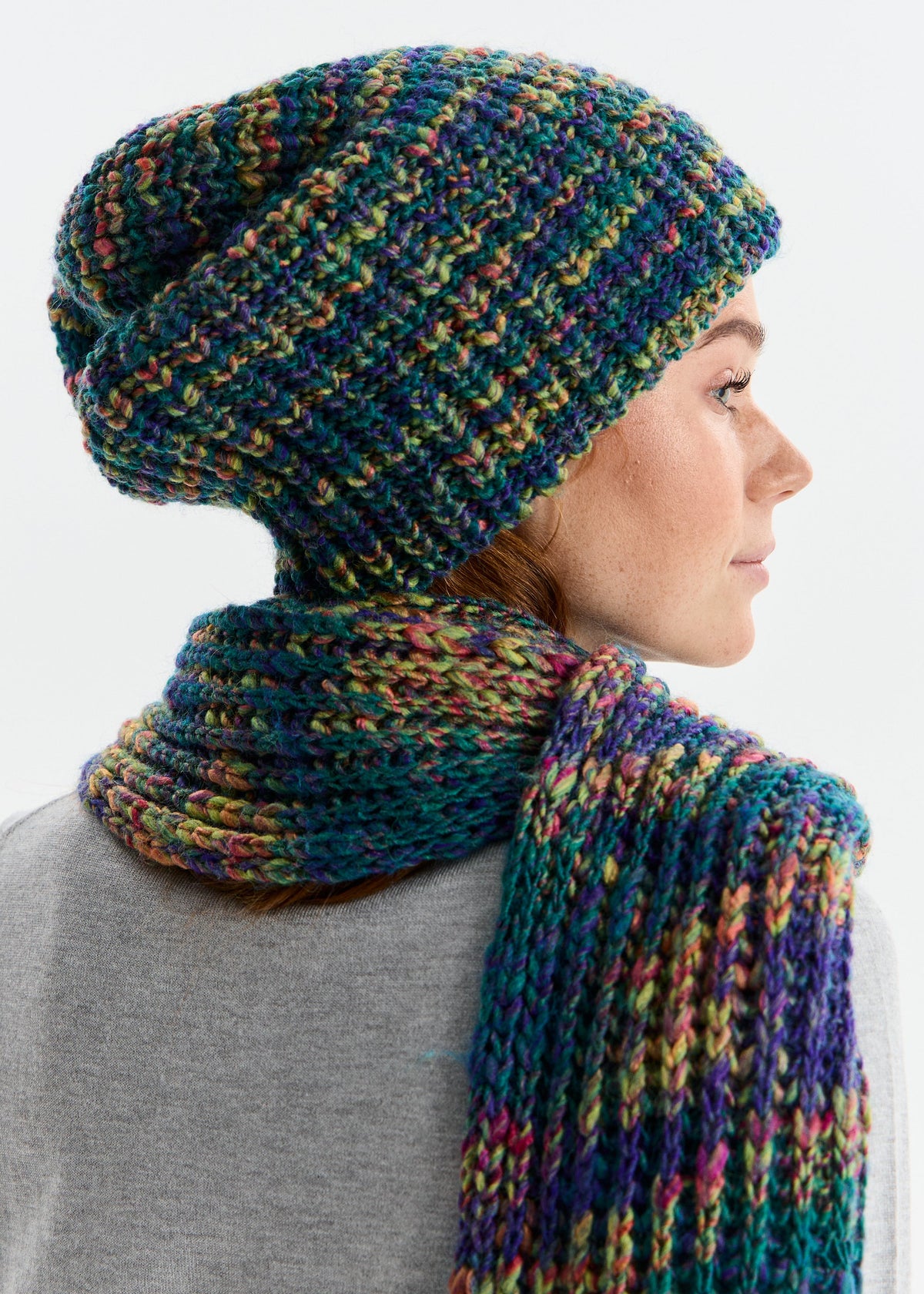 BRIKOLY London Lilac & Navy knit beanie shown in a close side view with a matching scarf.