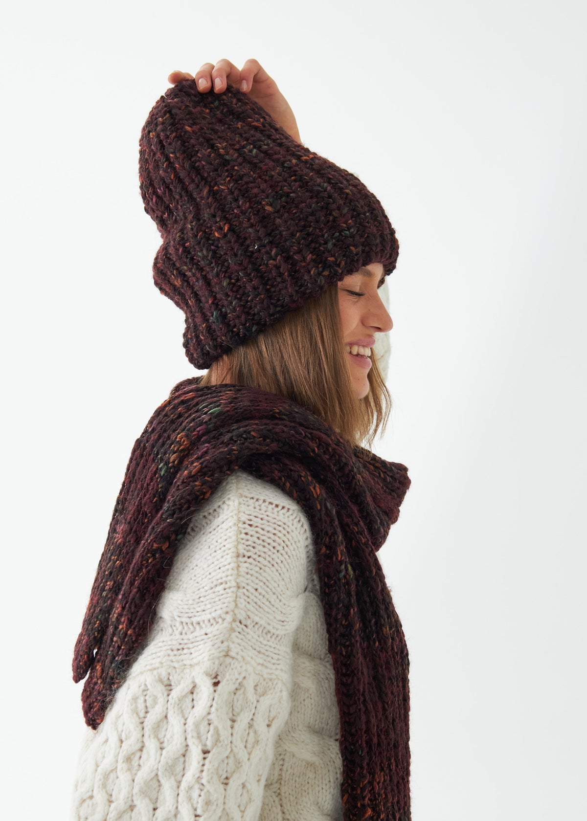Oversized Maroon & Black alpaca-wool scarf: Side outfit view with matching beanie; beanie sold separately