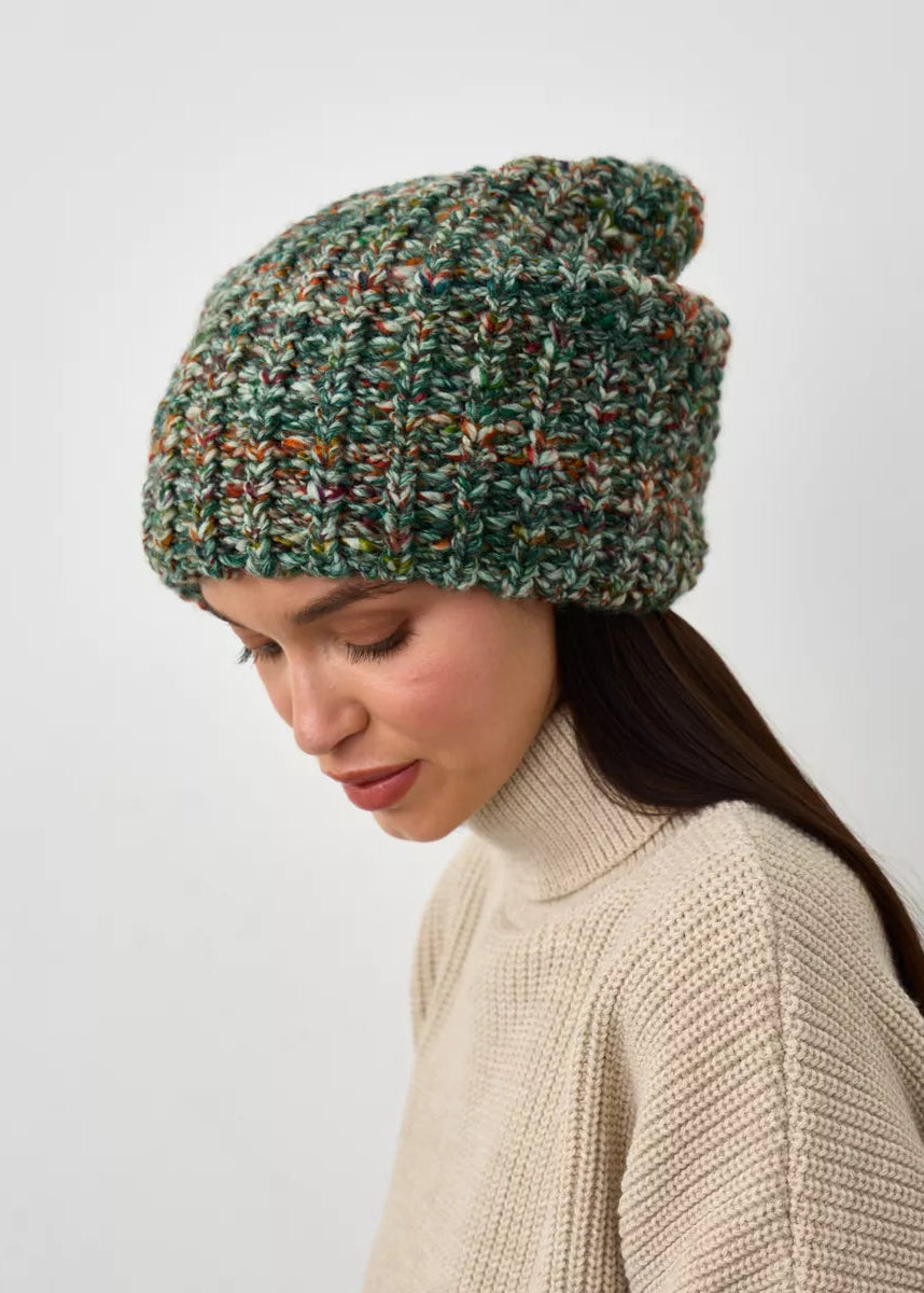 Oversized Green & Orange double-layer wool hat: Looking-down side portrait