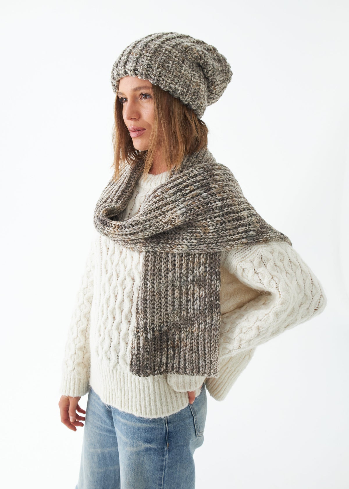 Oversized Gray alpaca-wool scarf: Three-quarter outfit view wrapped at the neck; beanie sold separately