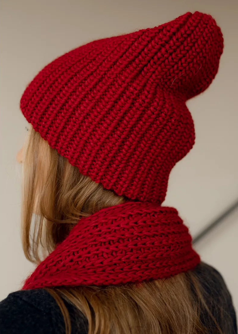 BRIKOLY London Burgundy knit beanie shown from the rear side with a matching scarf.