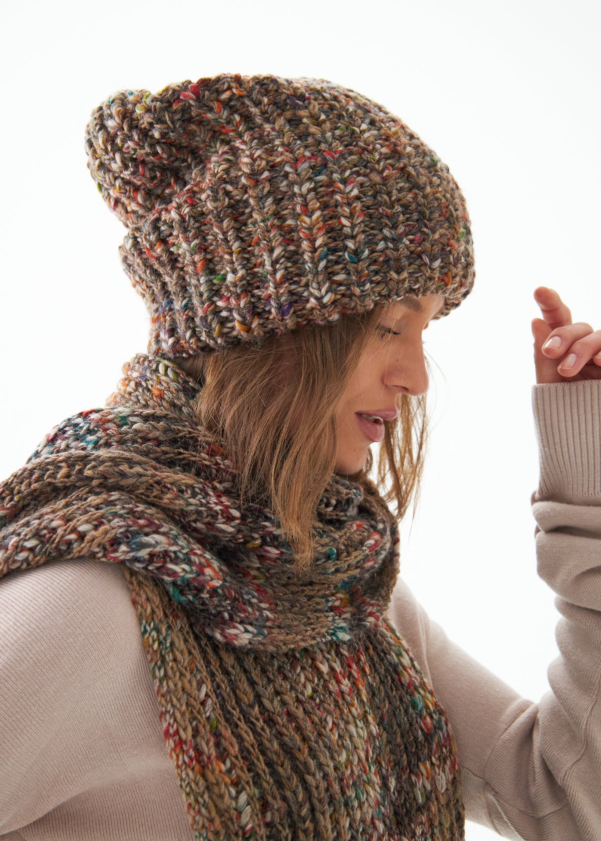 Oversized Multicolor alpaca-wool scarf: Side portrait wrapped at the neck; beanie sold separately