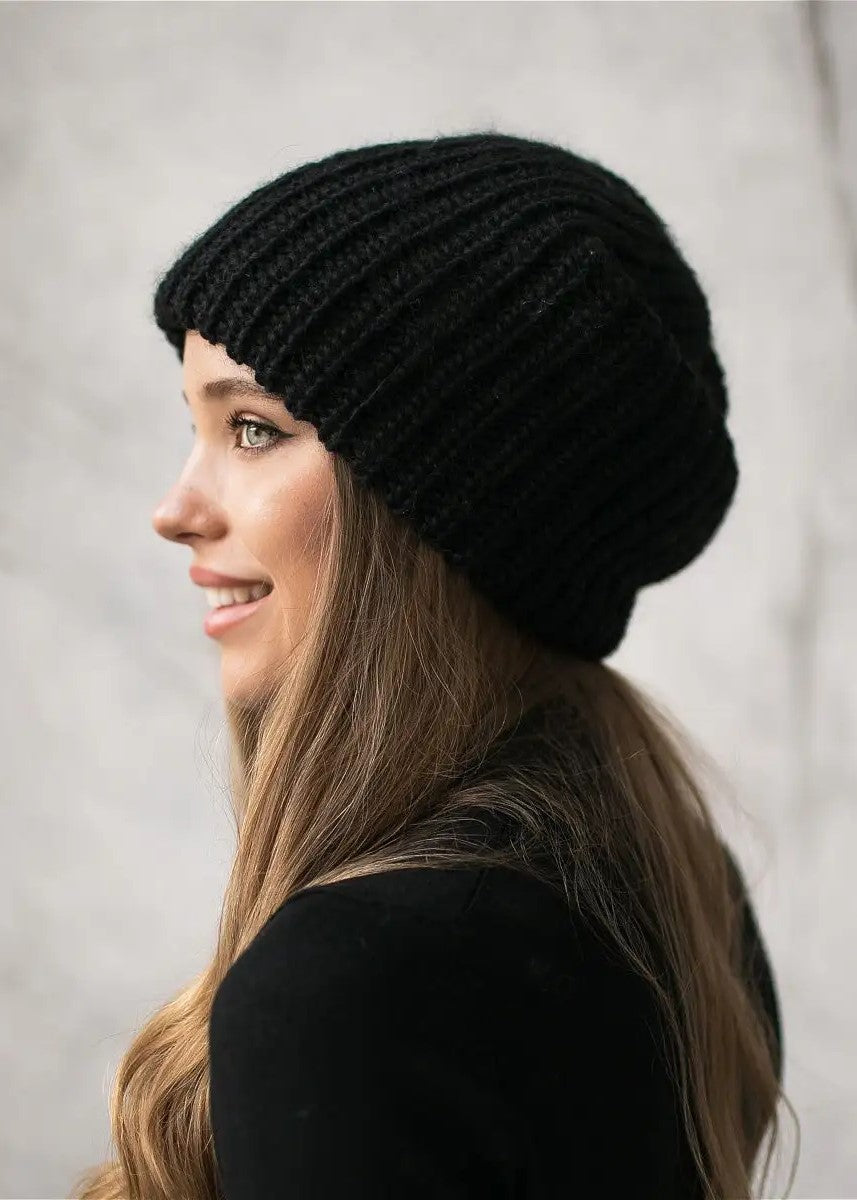 Oversized Black double-layer wool hat: Smiling side portrait