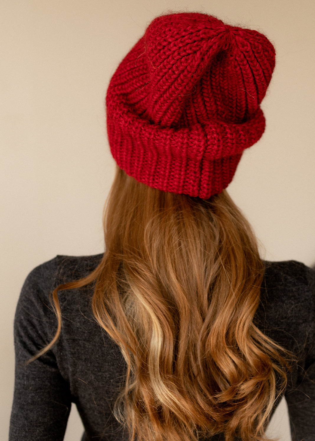 BRIKOLY London Burgundy knit beanie shown from the back.