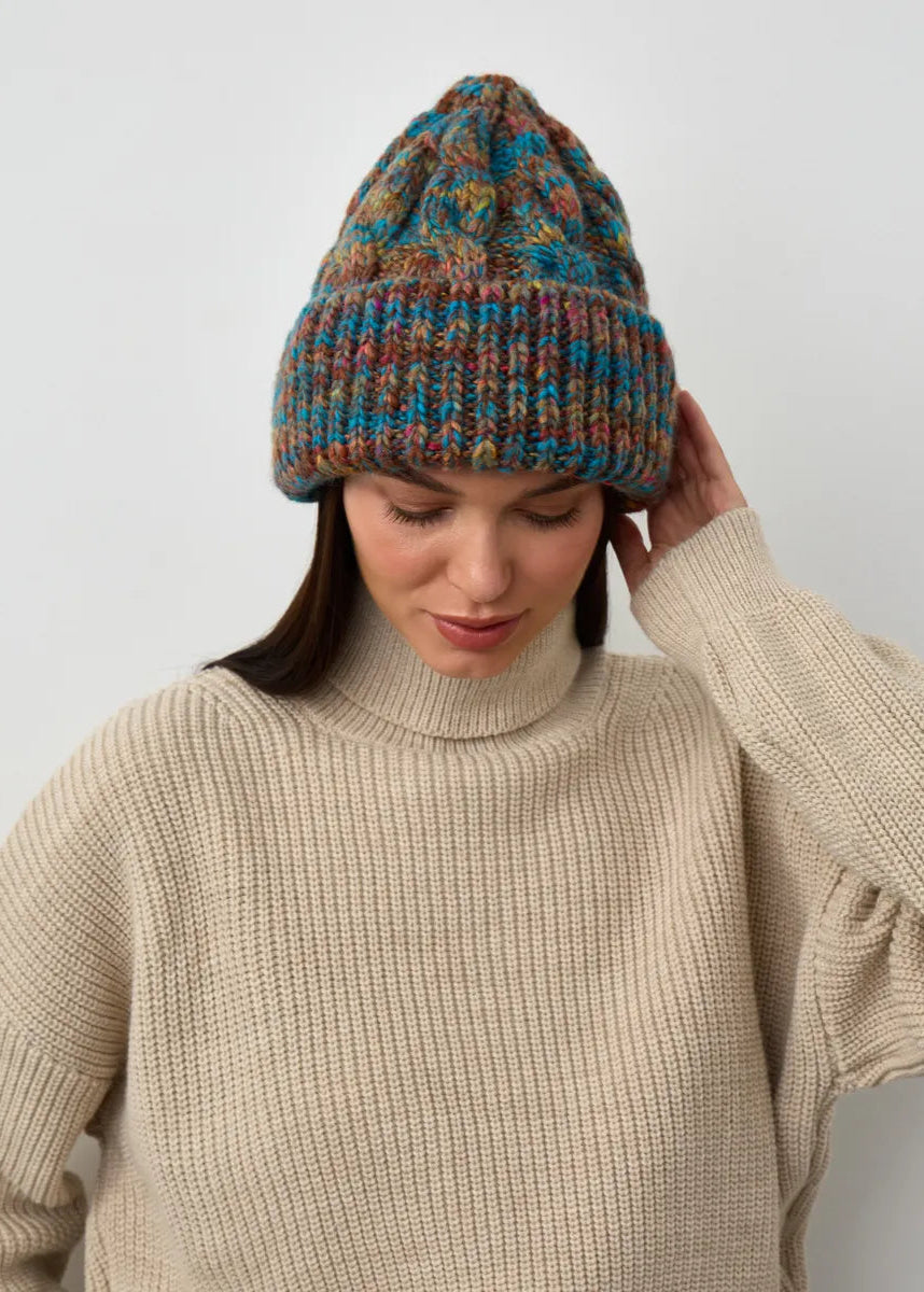 Tokyo Turquoise cable knit wool beanie: Looking-down front portrait