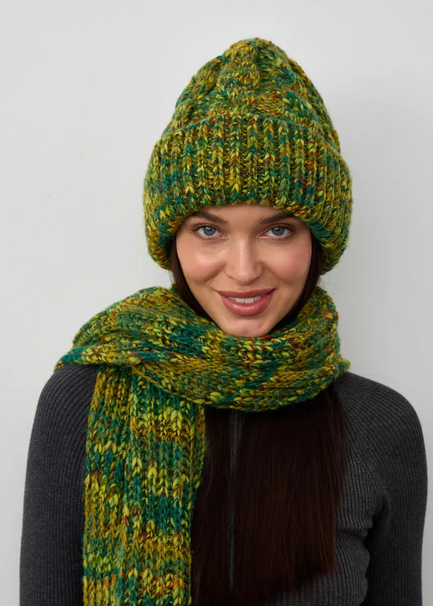 Tokyo Khaki cable knit wool beanie: Front portrait with matching scarf wrapped at the neck, sold separately