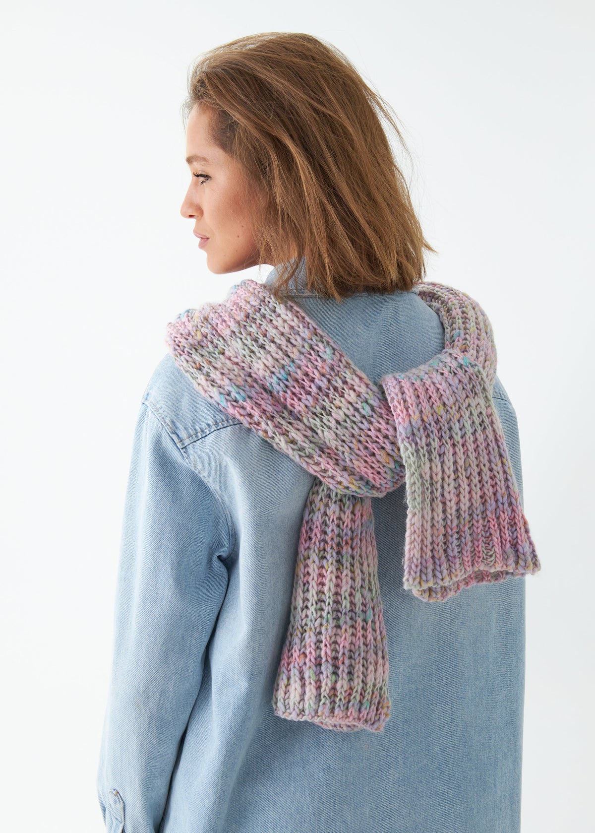 Oversized Unicorn alpaca-wool scarf: Back view showing scarf over the shoulders; beanie sold separately