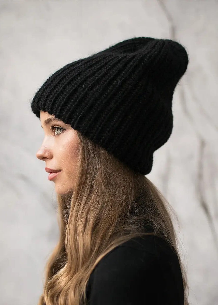 Oversized Black double-layer wool hat: Side profile showing the black ribbed knit