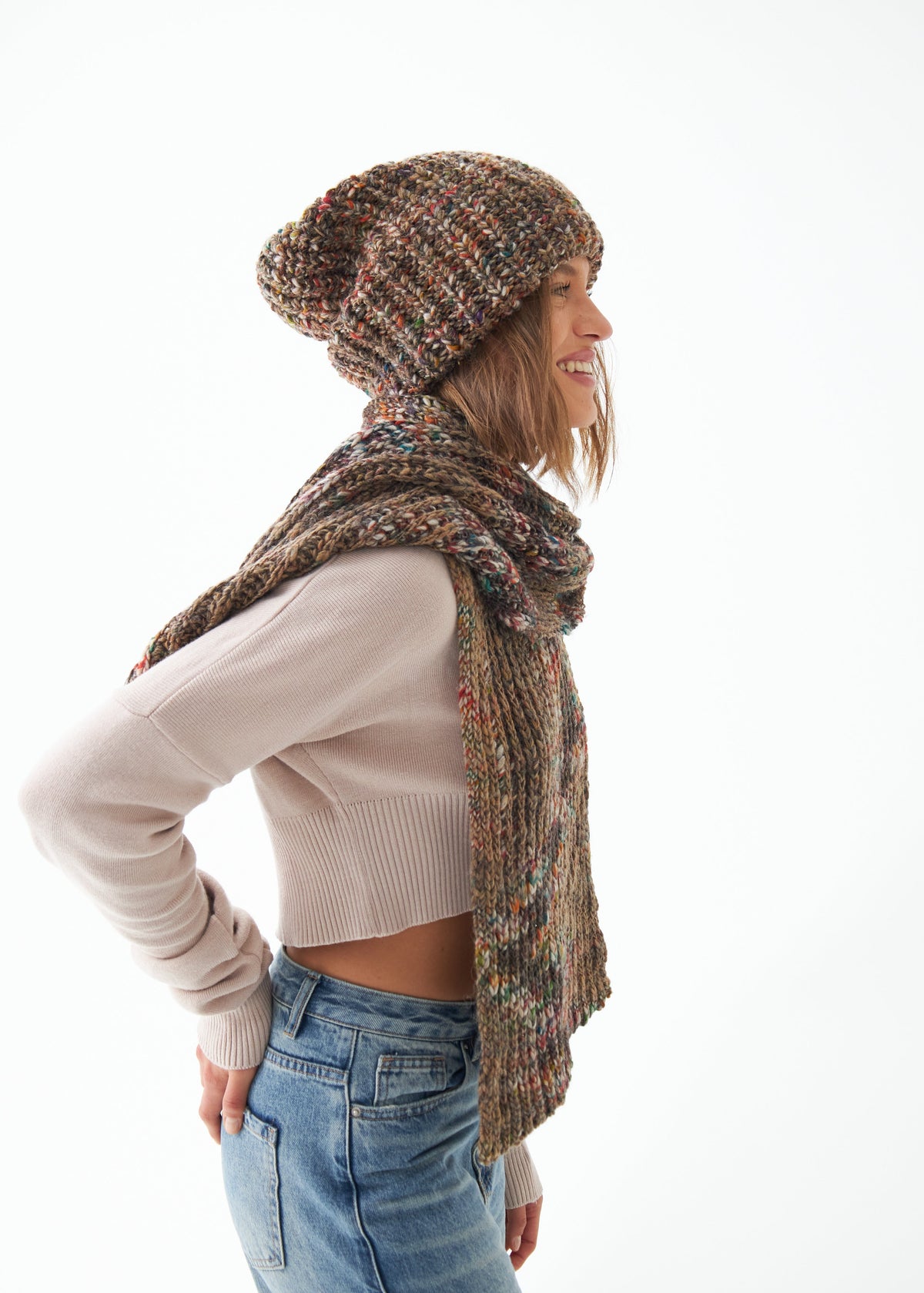 Oversized Multicolor alpaca-wool scarf: Side outfit view showing long scarf ends; beanie sold separately