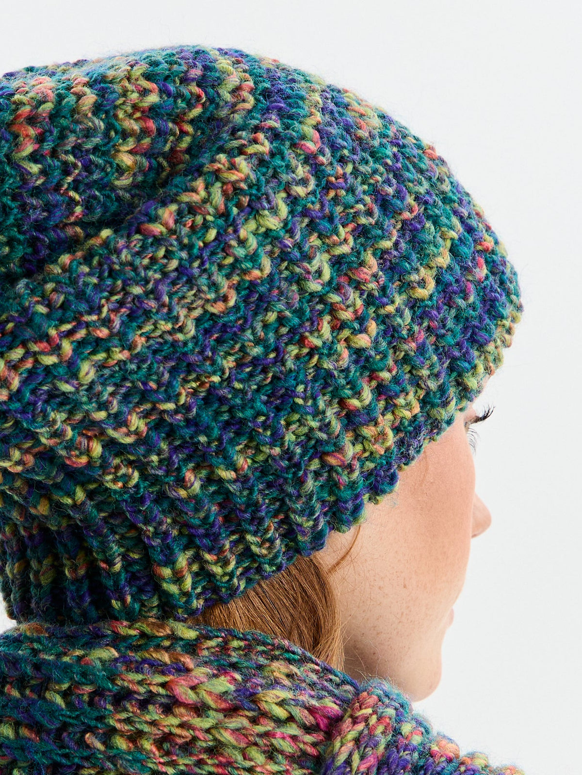 BRIKOLY London Lilac & Navy knit beanie shown in a detail view of the multicolor knit.