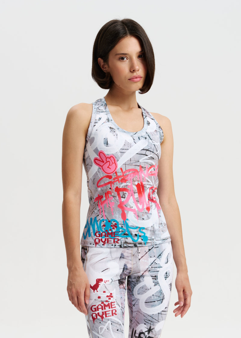 Woman wearing a sleeveless dress with colorful text and graphics on a white background