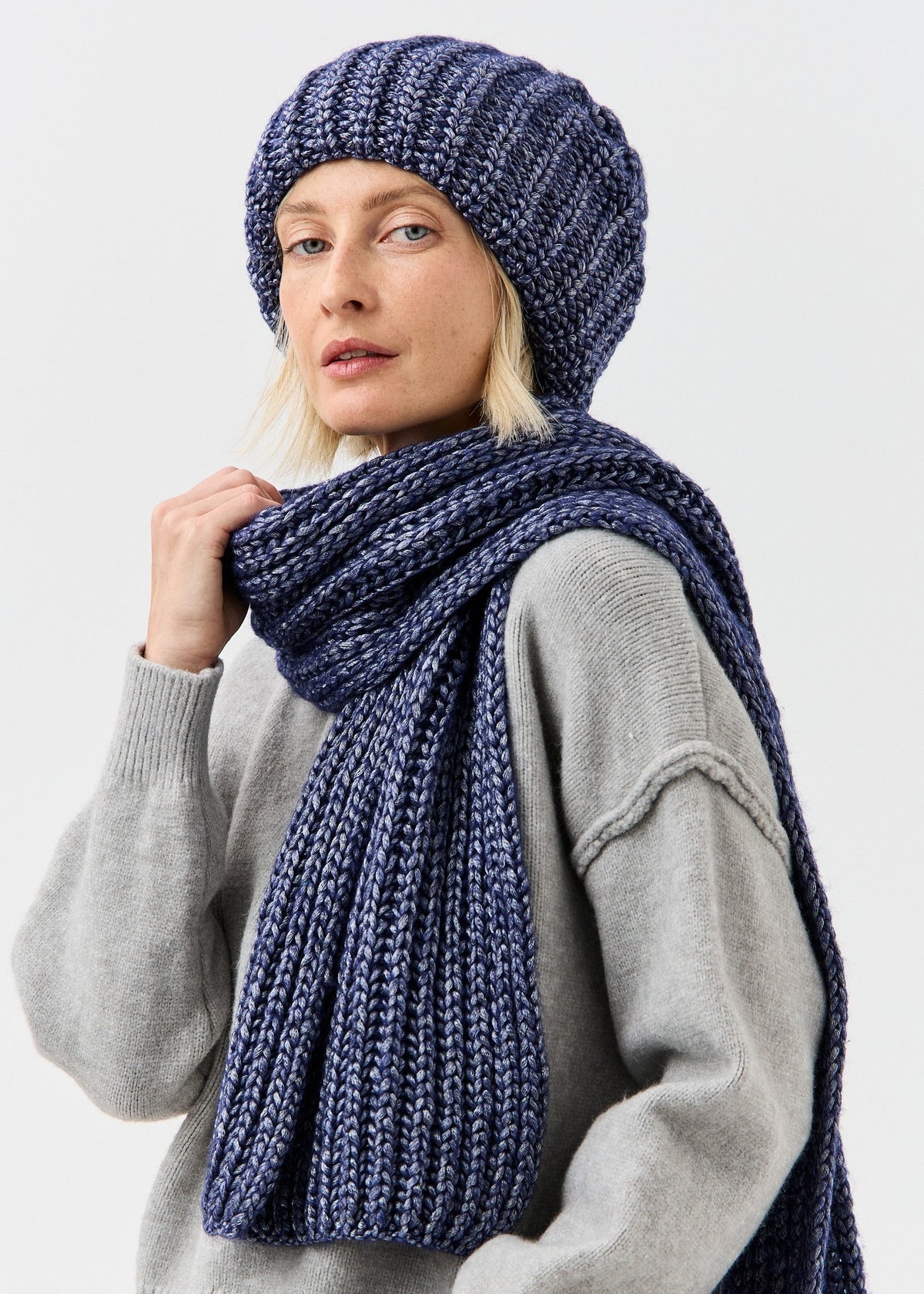 Lustre Denim Melange alpaca-wool scarf: Three-quarter portrait showing long ribbed end; beanie sold separately