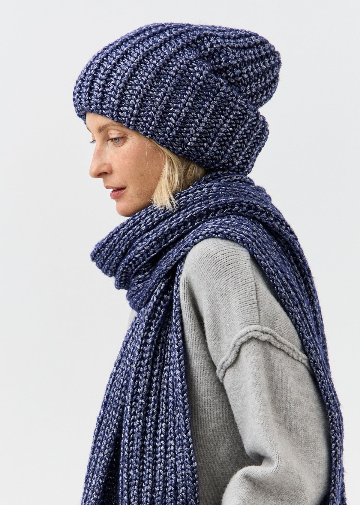 Lustre Denim Melange alpaca-wool scarf: Side view showing scarf over the shoulder; beanie sold separately