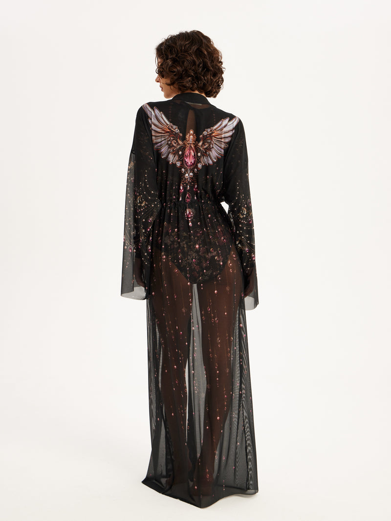 Black evening gown with sheer overlay and detailed back design on a white background