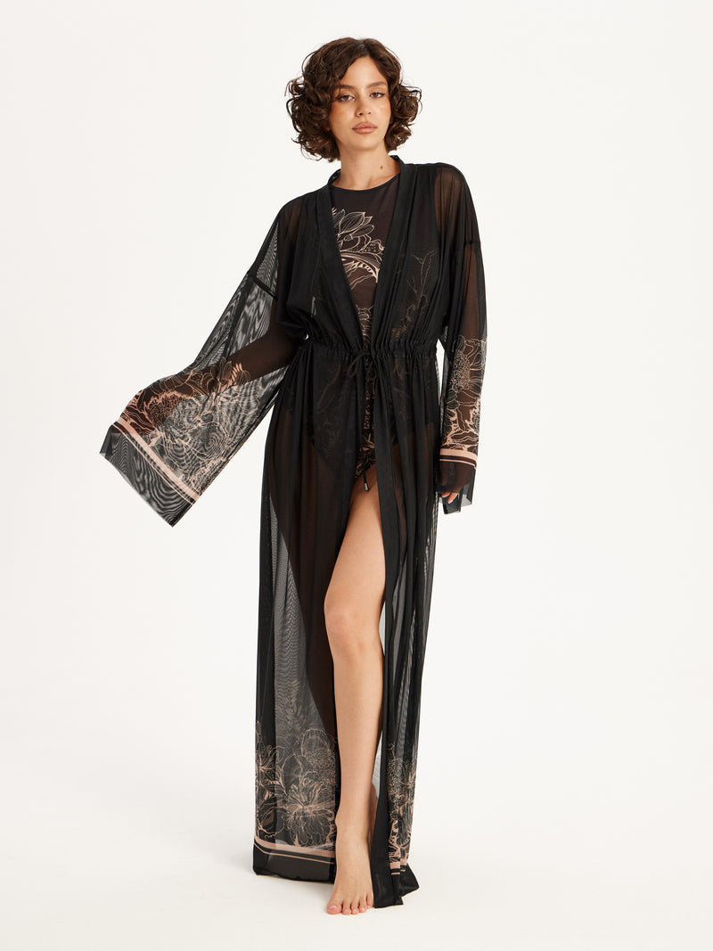 Black lace dress beach cover-up and smart  swimsuit spf50 with sheer overlay on a white background