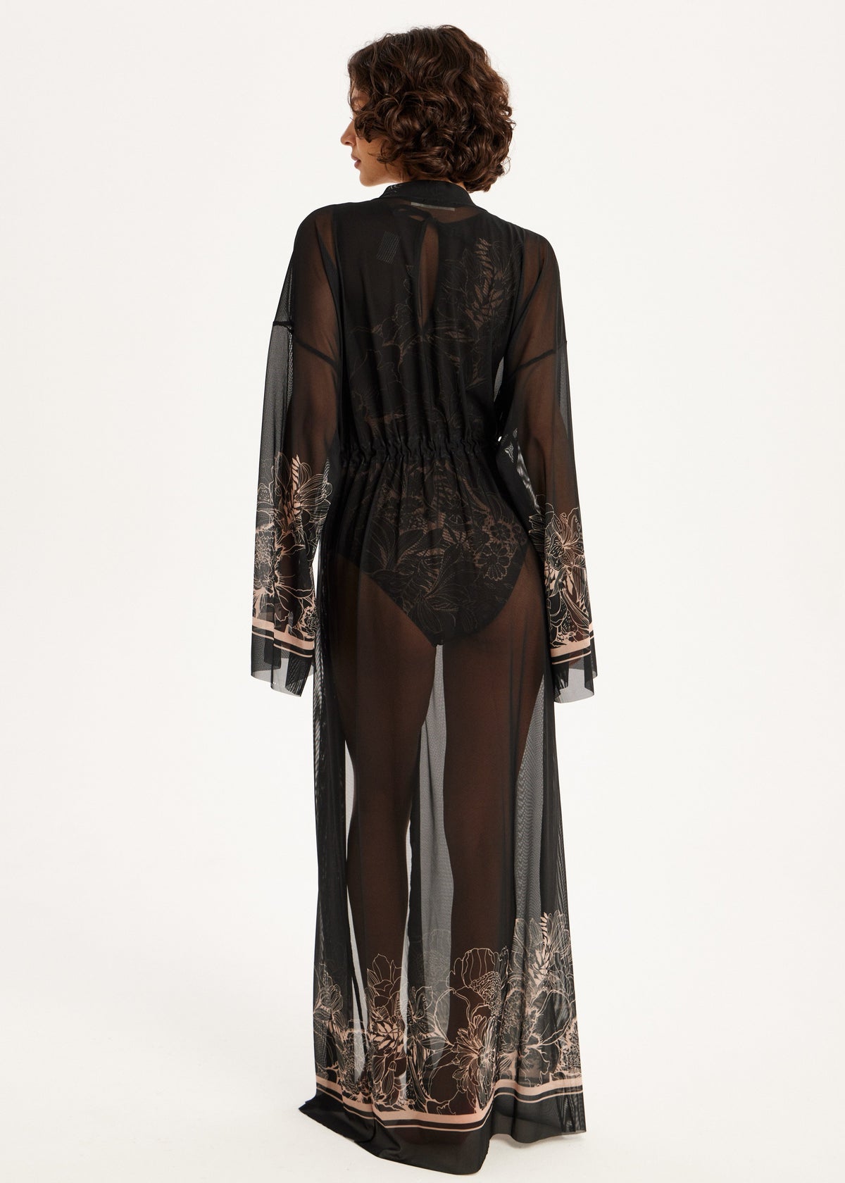 Black lace dress beach cover-up spf50 with sheer overlay on a white background
