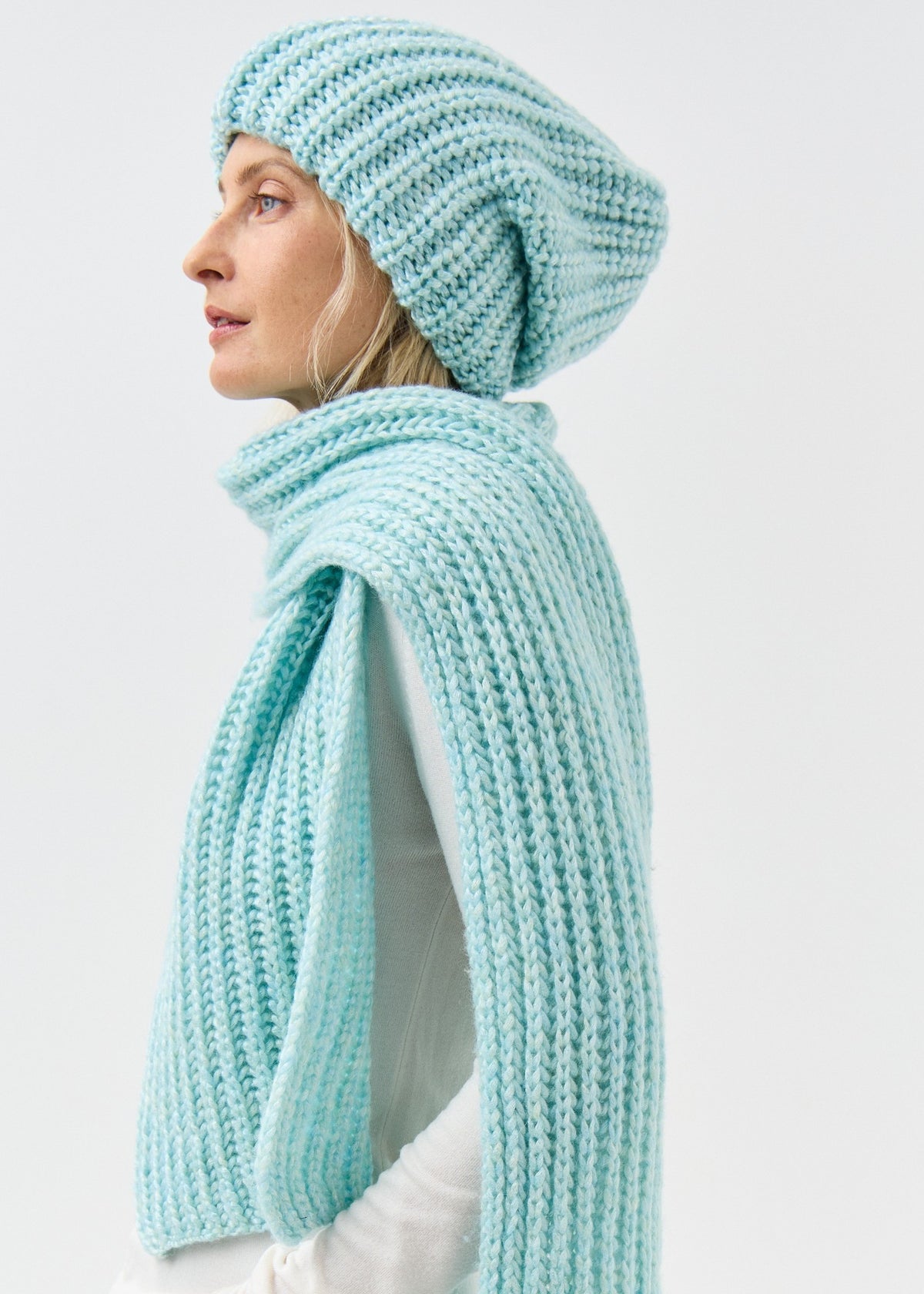 Lustre Blue Melange alpaca-wool scarf: Side profile showing the scarf end; beanie sold separately