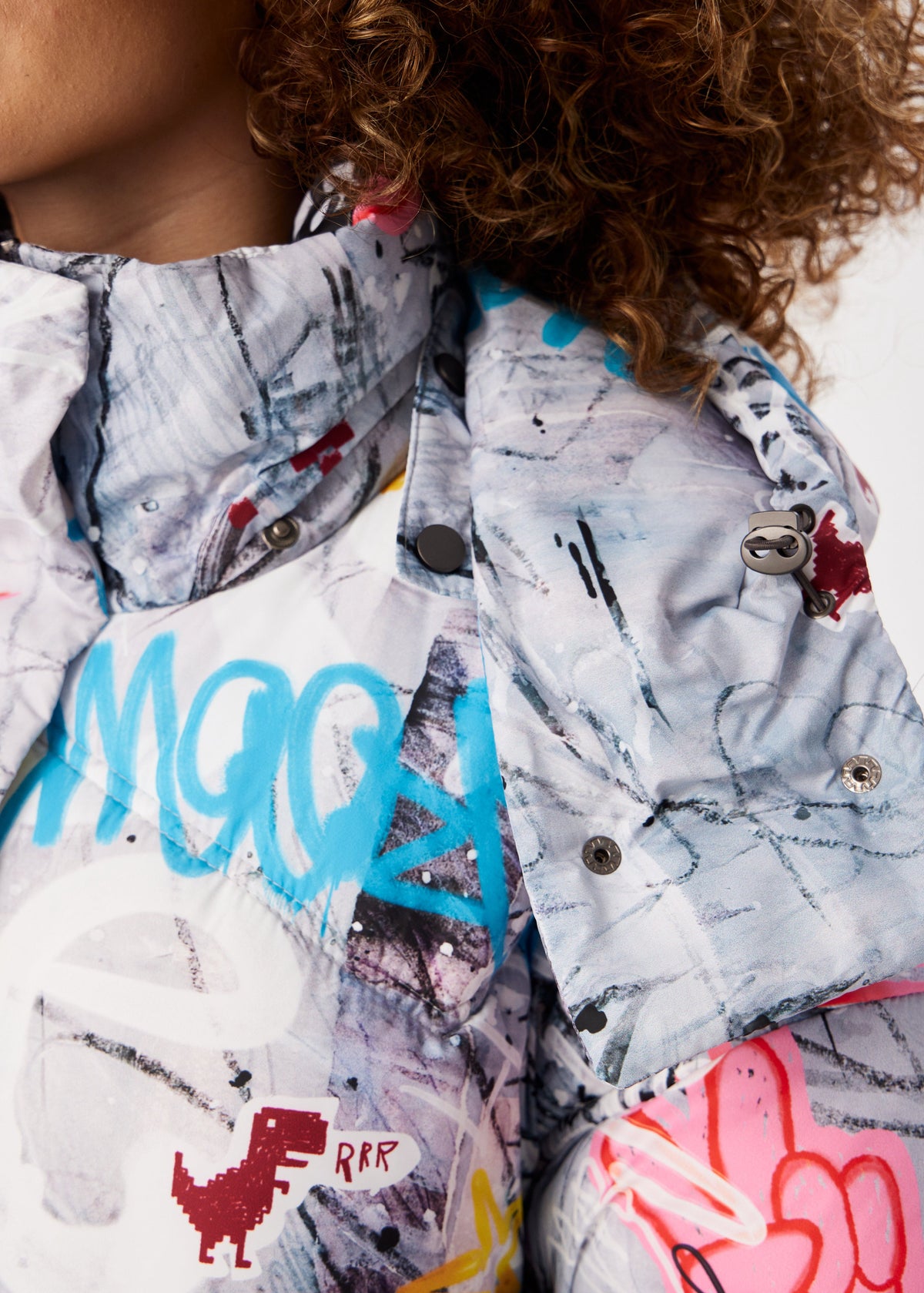 Graffity Printed Puffer Jacket for Women – Artistic & Cozy Design - BRIKOLY