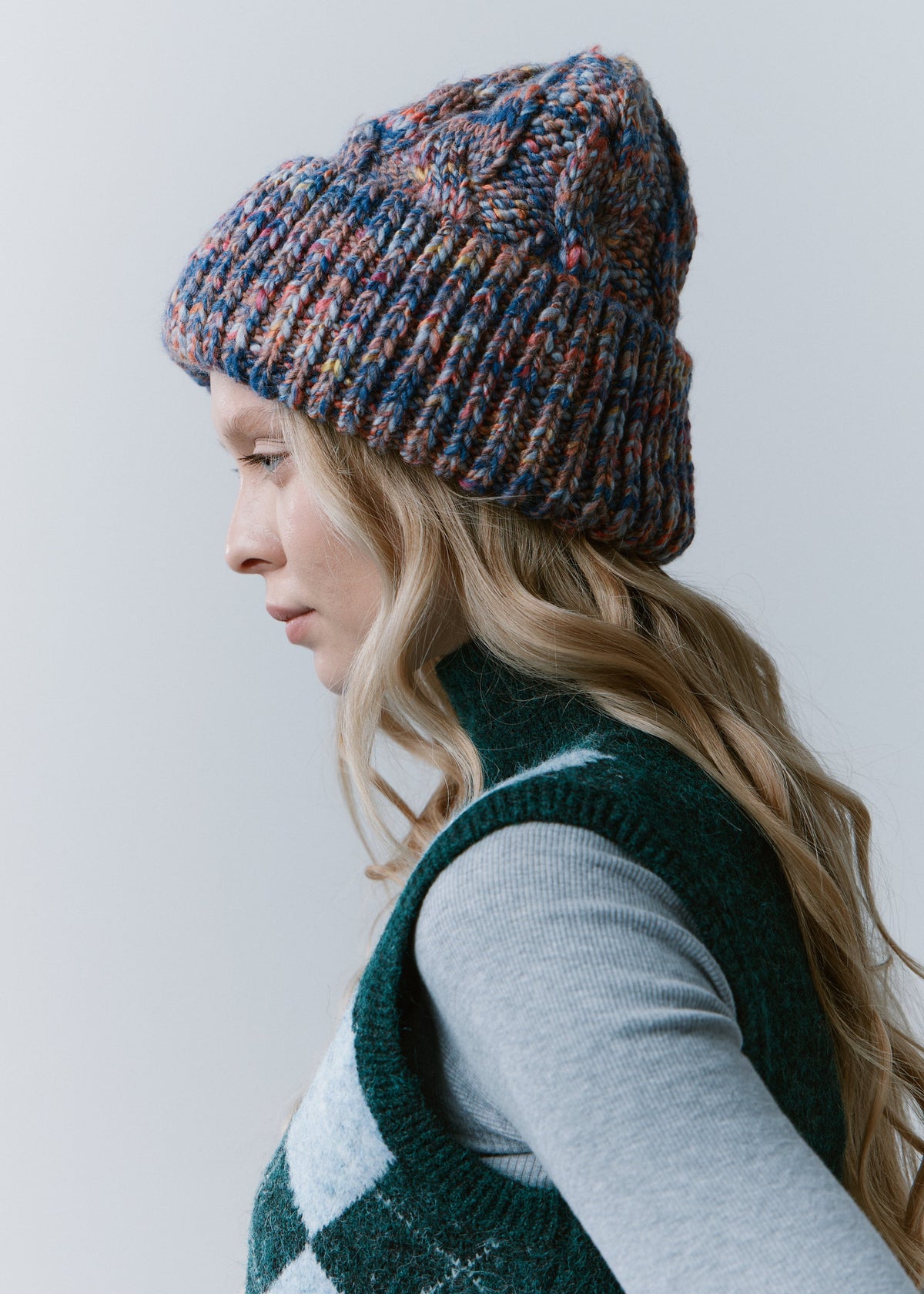 Tokyo Pink and Blue cable knit wool beanie: Side profile showing the cable knit crown