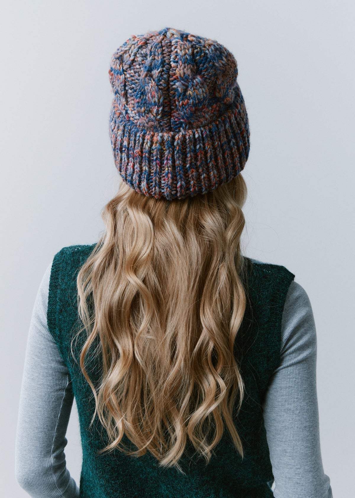 Tokyo Pink and Blue cable knit wool beanie: Back view of the cable knit crown