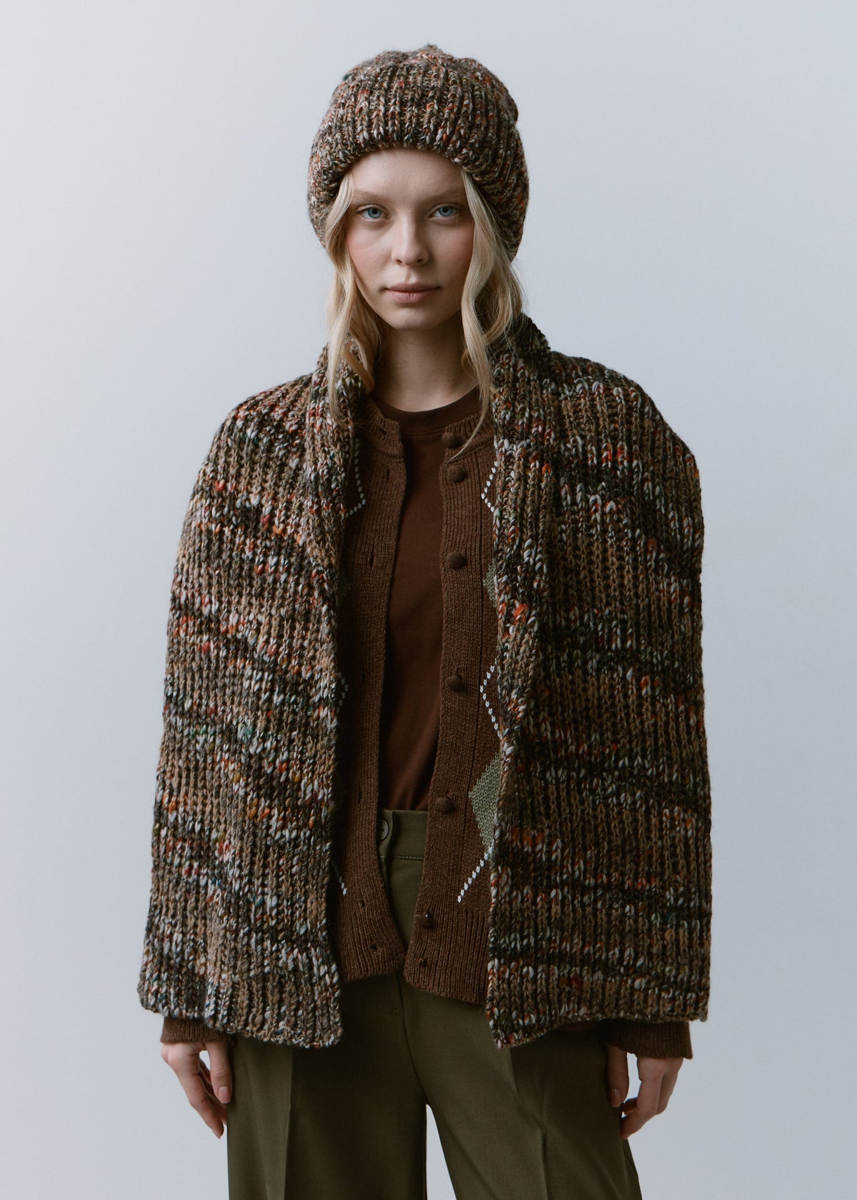 Tokyo Multicolor cable knit wool beanie: Outfit view with matching scarf draped over shoulders, sold separately