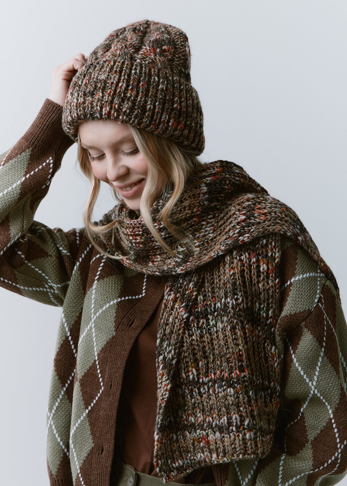 Tokyo Multicolor cable knit wool beanie: Looking-down portrait with matching scarf, sold separately