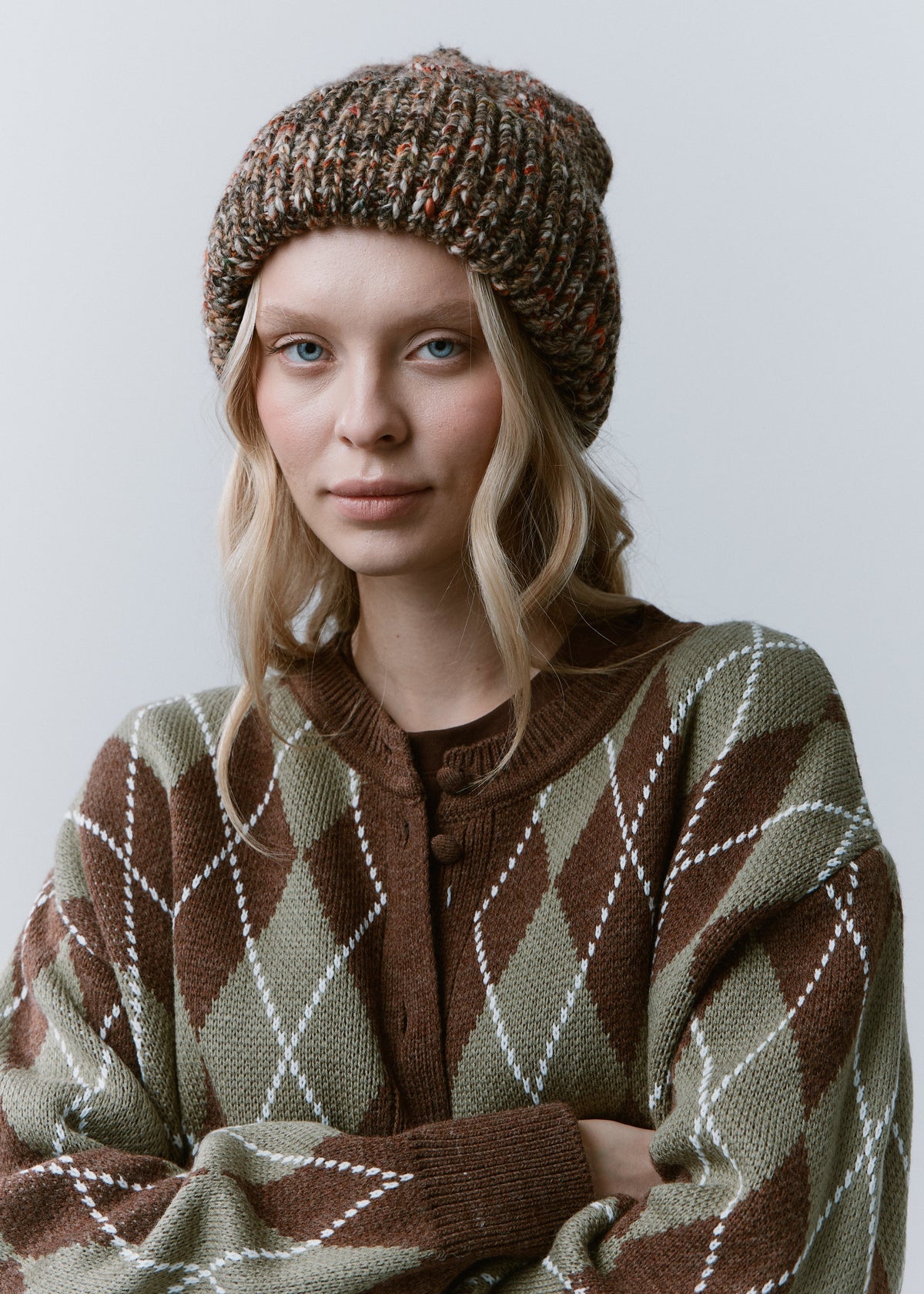 Tokyo Multicolor cable knit wool beanie: Front portrait with folded cuff
