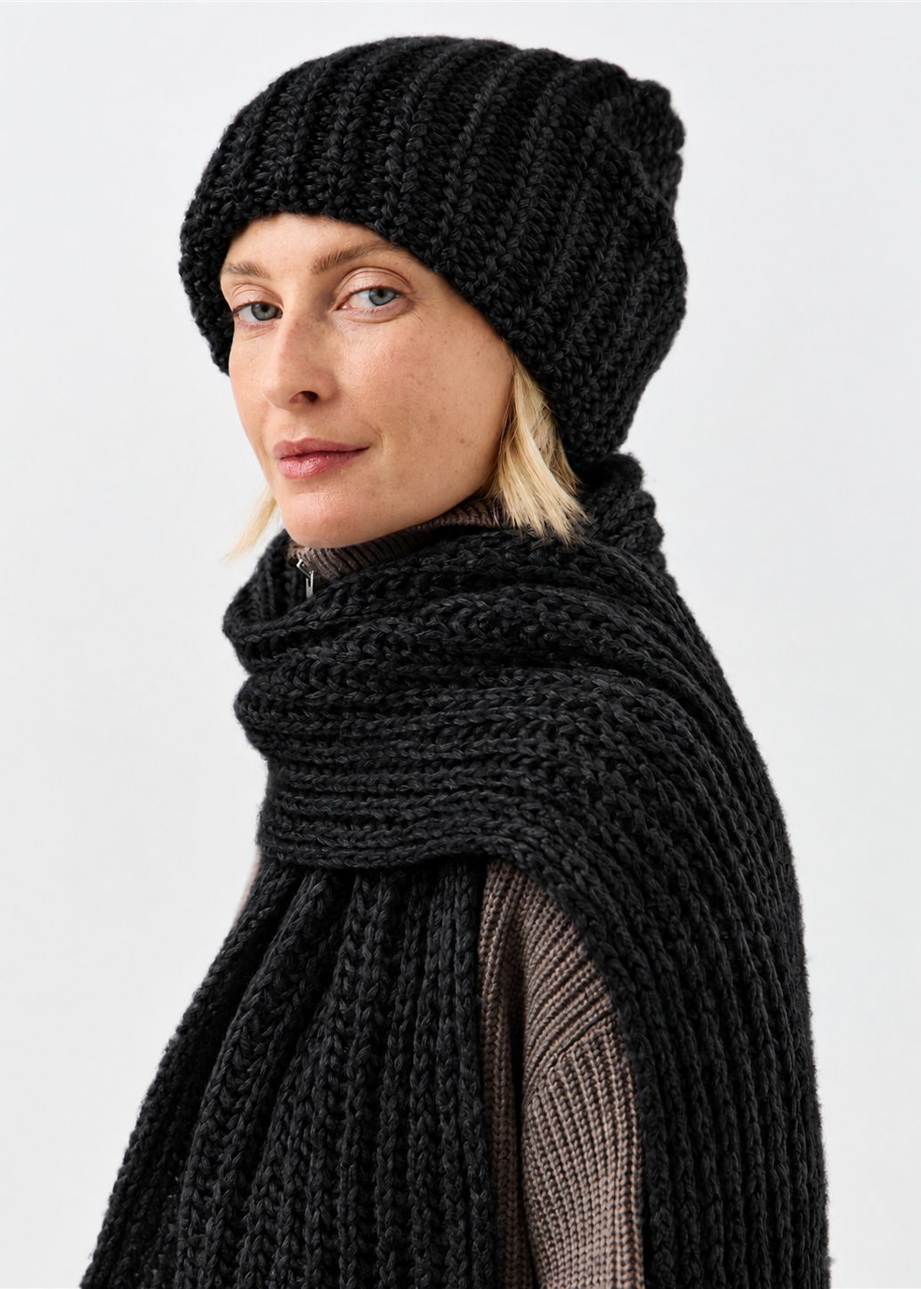 Lustre Black Melange alpaca-wool scarf: Three-quarter close-up wrapped at the neck; beanie sold separately